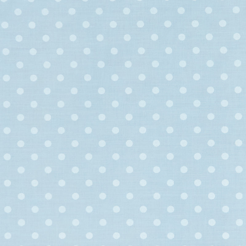 Swatch of classic pastel polka dot printed polycotton fabric in blue