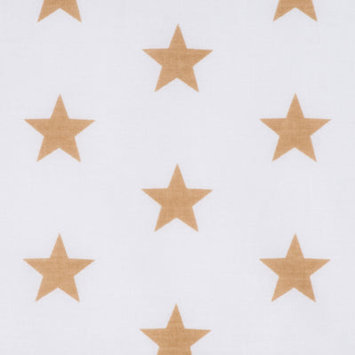 Swatch of bright and fun bold star motif polycotton fabric on white with gold