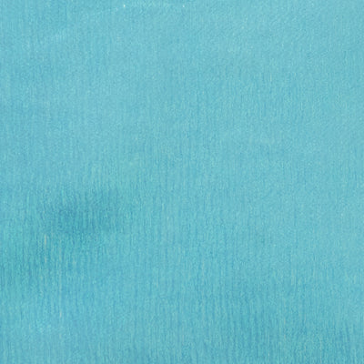 Swatch of shimmering, pearlescent rainbow 100% polyester organza fabric in turquoise blue