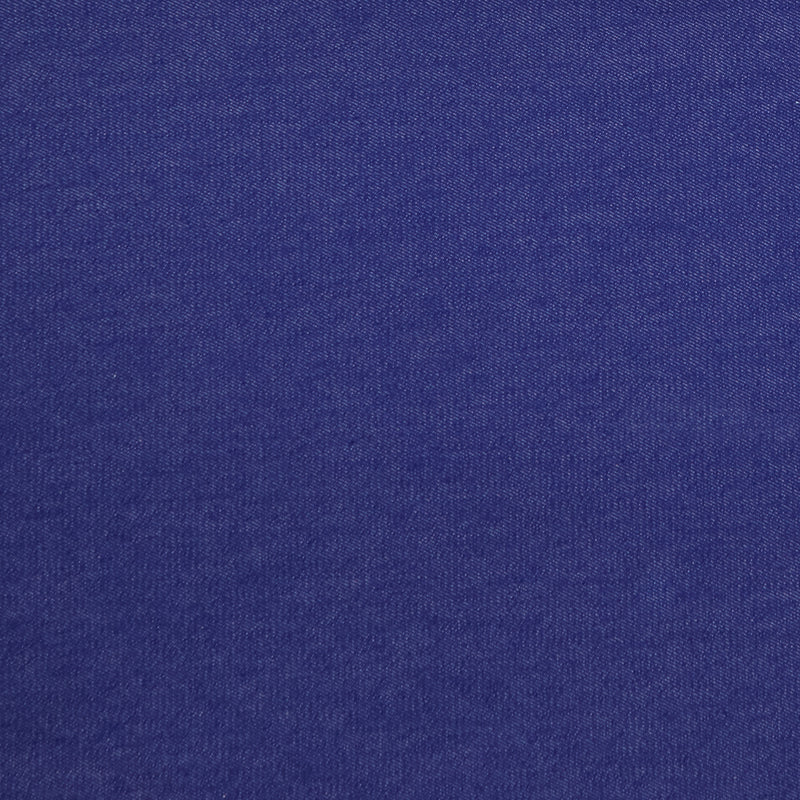 Swatch of yarn dyed stretch denim fabric in blue