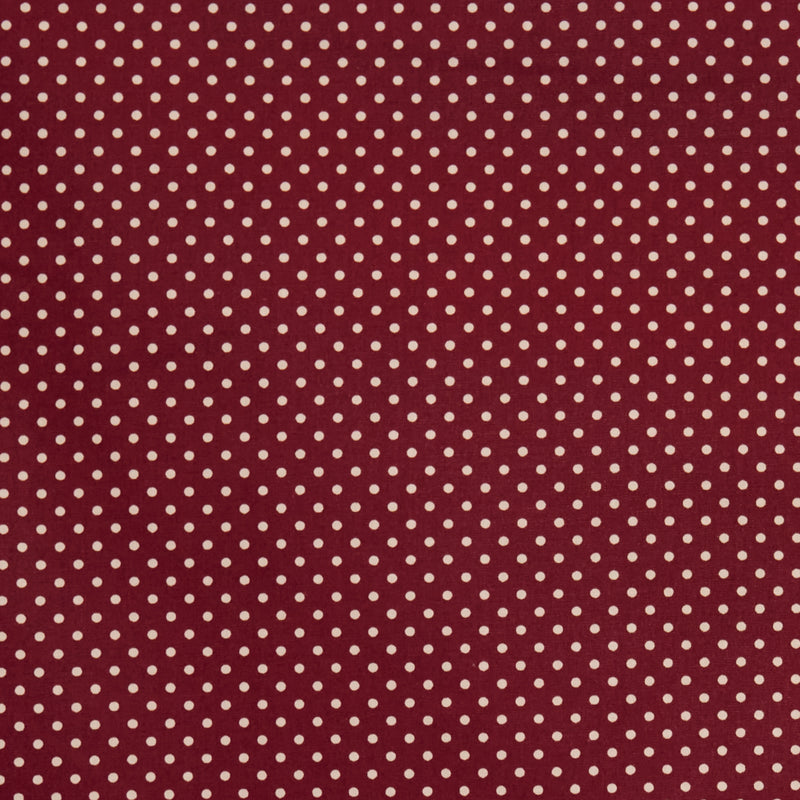 Swatch of pretty polka dot print 100% cotton poplin fabric by Rose and Hubble in burgundy red