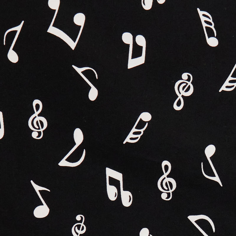 Swatch of colourful, bold and retro musical note print 100% cotton poplin fabric by Rose and Hubble with clefts and quavers in black and white