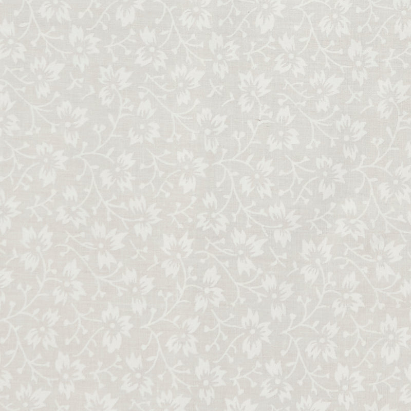 Swatch of elegant, swirling white flowers on pastel polycotton fabric in ivory
