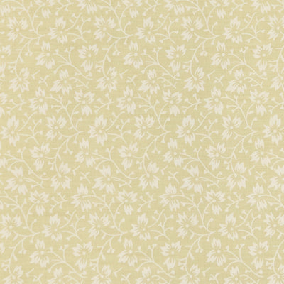 Swatch of elegant, swirling white flowers on pastel polycotton fabric in lemon yellow