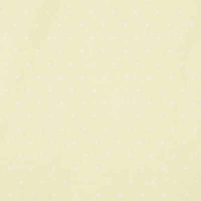 Swatch of small classic polka dot printed polycotton fabric in pastels in Lemon yellow.