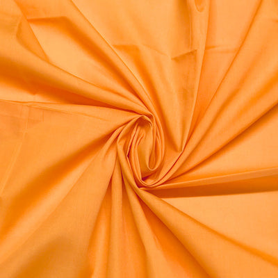 Plain polycotton fabric swatch in pumpkin 34