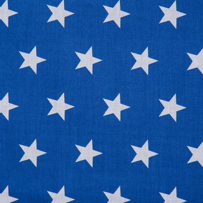 Swatch of fun and bold white stars on polycotton fabric in royal blue
