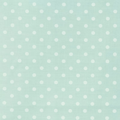 Swatch of classic pastel polka dot printed polycotton fabric in mint green