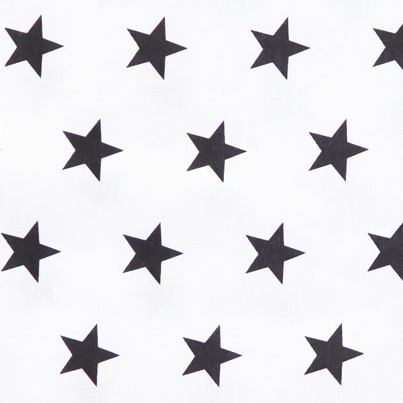 Swatch of bright and fun bold star motif polycotton fabric on white with black