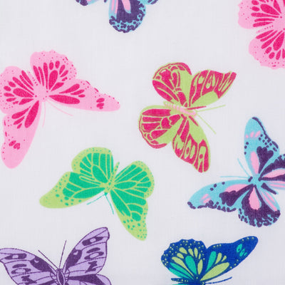 Swatch of dancing, elegant butterfly printed polycotton fabric in purple on white