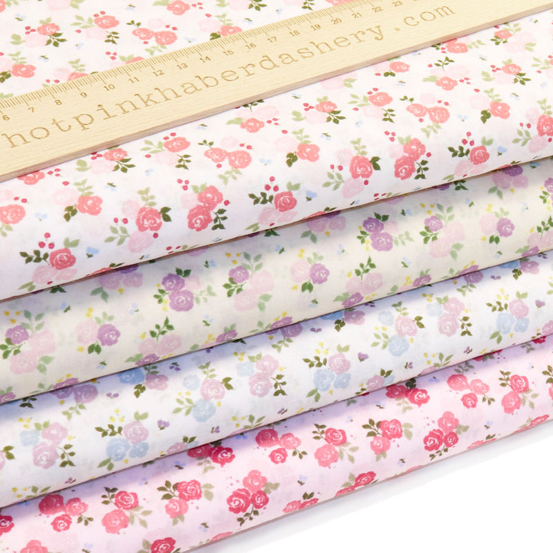 Pretty rose bouquets and leaves printed polycotton fabric in Pink, White, Blue & Cream/Lilac