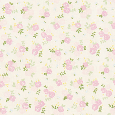 Swatch of pretty rose bouquets and leaves printed polycotton fabric in cream and lilac