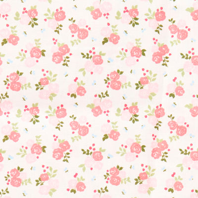 Swatch of pretty rose bouquets and leaves printed polycotton fabric in white and pink