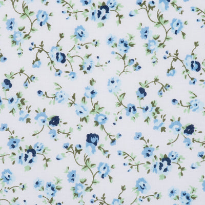 Swatch of vintage floral illustrated, country style, polycotton fabric in white and blue