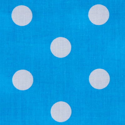 Swatch of large 50's style retro spots on polycotton fabric in blue