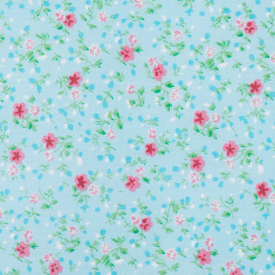 Swatch of vintage style pretty blooms floral polycotton fabric in turquoise and pink
