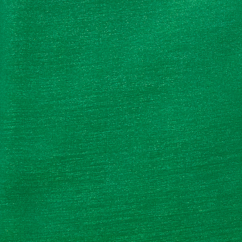 Swatch of Chinese crystal shimmer organza fabric in emerald green