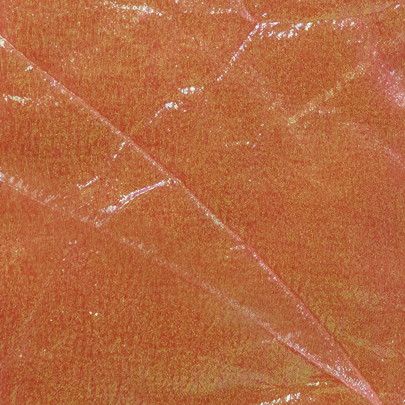 Swatch of shimmering, pearlescent rainbow 100% polyester organza fabric in red