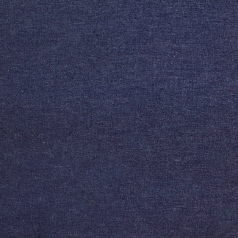 Swatch of washed 100% cotton denim fabric 4oz light weight in dark blue