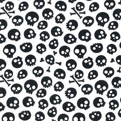 Swatch of spooky skulls Halloween print polycotton fabric in black and white