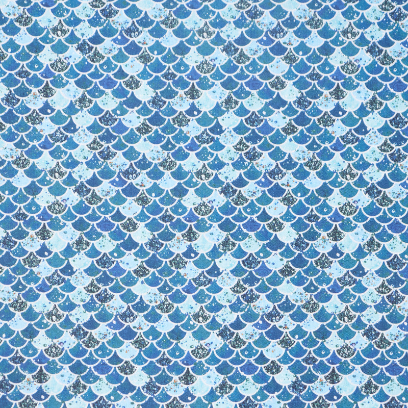 Swatch of Mermaid scales 100% cotton fabric in blue by Chatham Glyn