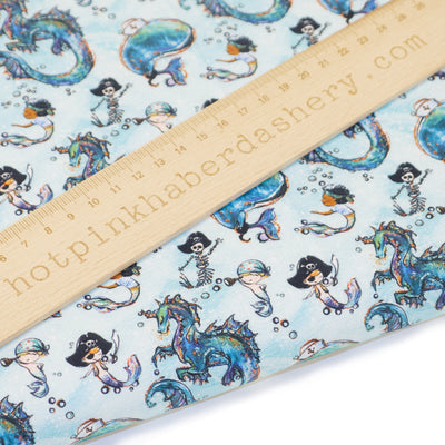 Blue mermaid boys fabric in 100% cotton by Chatham Glyn