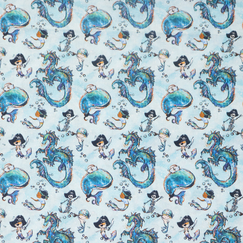 Swatch of blue mermaid boys fabric in 100% cotton by Chatham Glyn