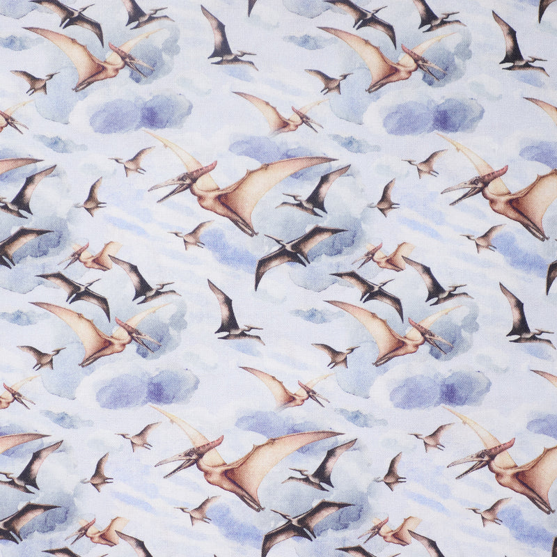 Swatch of flying dinosaurs 100% cotton fabric by Chatham Glyn