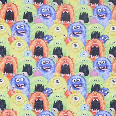Swatch of 100% cotton children's fabric with monsters by Chatham Glyn