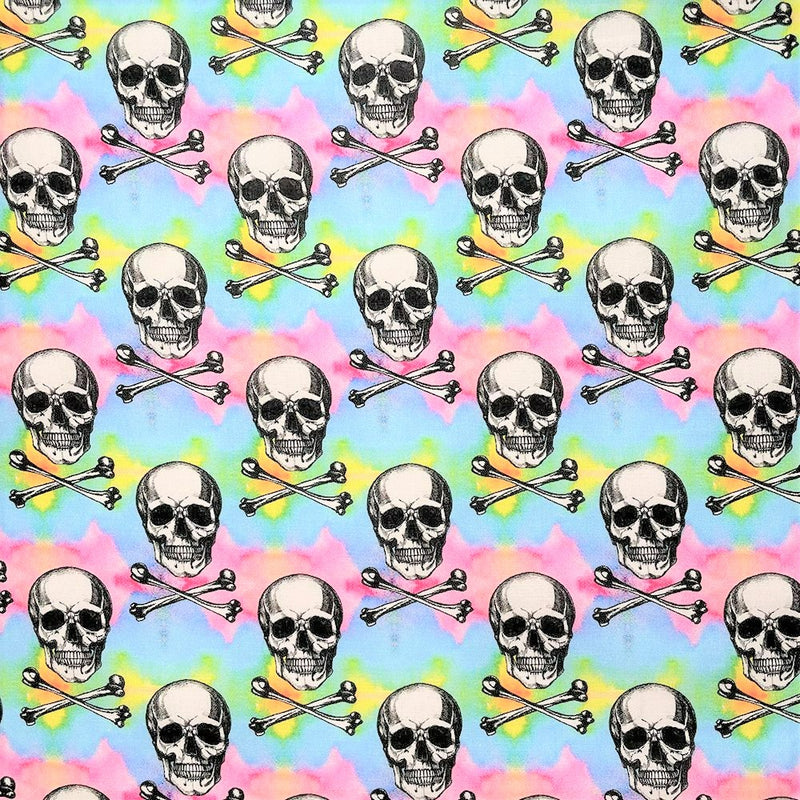 Swatch of rainbow skulls 100% cotton fabric by Chatham Glyn