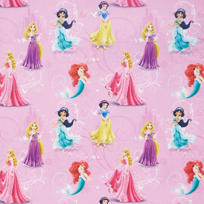 Swatch of Disney Princess fabric in 100% cotton fabric by Chatham Glyn in pink