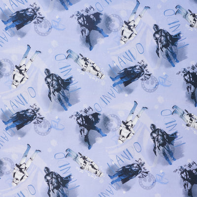 Swatch of Star Wars Mandalorian and Storm Trooper 100% cotton fabric by Chatham Glyn on Light blue