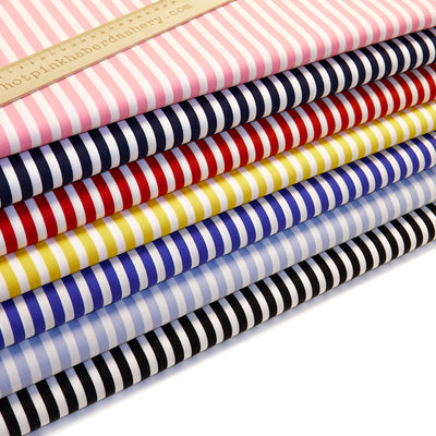Classic, colourful, seaside bold stripes on 100% cotton poplinn fabric by Rose and Hubble in Black, Navy, Royal, Pale Blue, Pink, Red & Yellow