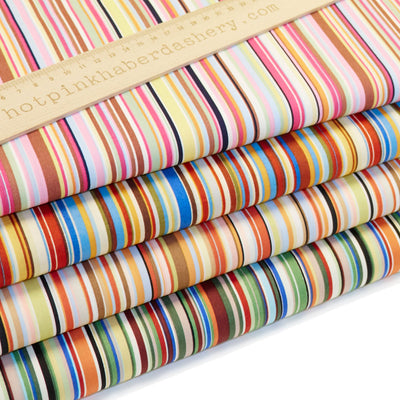 Retro style, unique and multi coloured striped 100% cotton poplin fabric by Rose and Hubble in Pink, Blues, Browns & Greens 