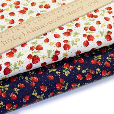 Wild strawberry print mixed with flowers & pin dots on 100% cotton poplin fabric by Rose and Hubble in ivory and navy blue 