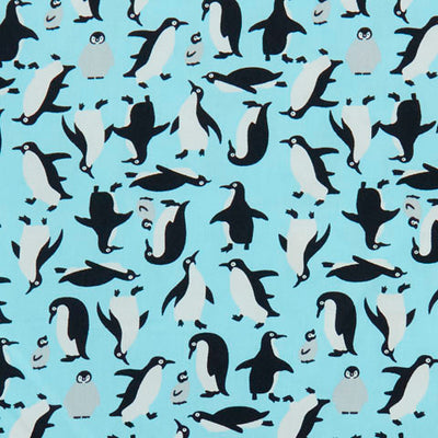 Swatch of fun penguin printed 100% cotton poplin fabric by Rose and Hubble in blue 