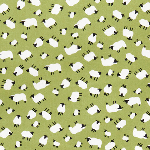 Swatch of playful sheep print 100% cotton poplin fabric by Rose and Hubble on green 