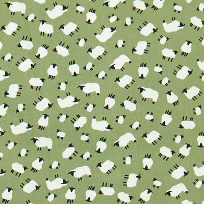 Swatch of playful sheep print 100% cotton poplin fabric by Rose and Hubble on sage green 