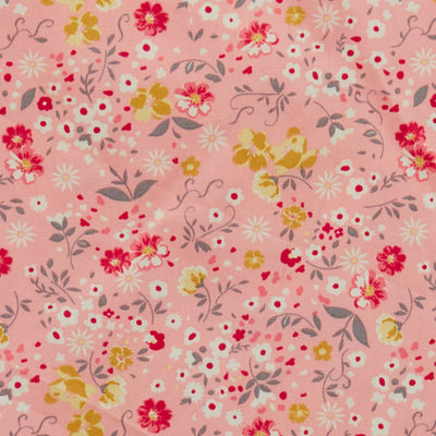Swatch of fun, summer flowers and leaves printed 100% cotton poplin fabric by Rose and Hubble in Pastel Pink