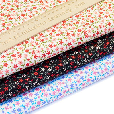 Chic flower stem print 100% cotton poplin fabric by Rose and Hubble in Black, Coral & Blue