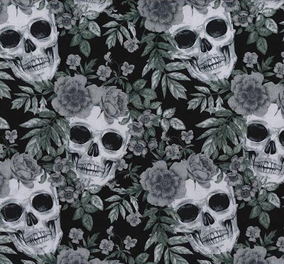 Swatch of Mexican 'Dia de los Muertos' festival skulls and wildflowers printed 100% cotton poplin print fabric by Rose and Hubble in black and grey, Halloween fabric