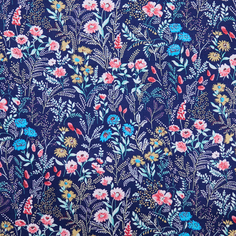 Swatch of 100% cotton poplin fabric by Rose and Hubble with elegant countryside wild flowers in Navy