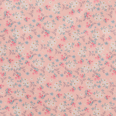 Swatch of 100% cotton poplin fabric by Rose and Hubble with star flower bouquets, leaves and buds in Pink