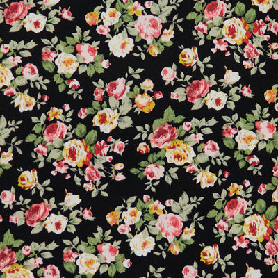 Swatch of 100% cotton poplin fabric with classic country garden rose bouquets in Black by Rose and Hubble