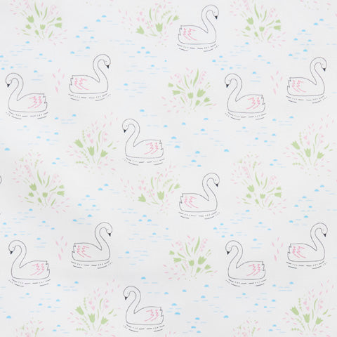 Swatch of delicate drawn swan print with water ripples and flowers on 100% cotton poplin fabric by Rose and Hubble on white