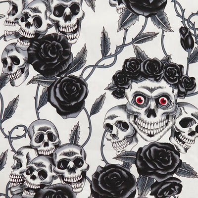 Swatch of gothic skulls and roses with thorns on 100% cotton poplin fabric by Rose and Hubble on black and ivory, Halloween fabric