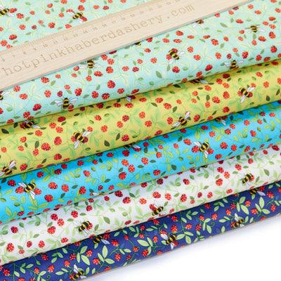 Fun bumble bees and strawberry vines print 100% cotton poplin by Rose and Hubble in Ivory, Meadow, Navy, Sky & Yellow. 