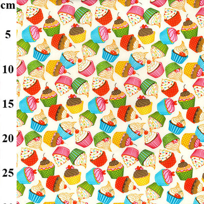 Swatch of funky and colourful cupcake print 100% cotton poplin fabric by Rose and Hubble in Cream