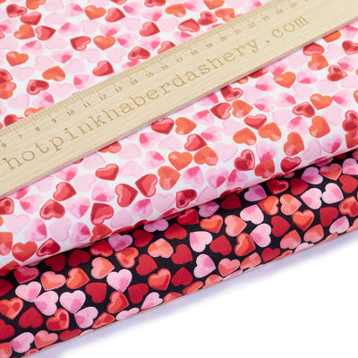 Red, white and pink confetti hearts print Rose & Hubble 100% cotton poplin Valentine Wedding fabric in black and white