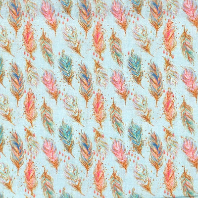 Swatch of chic feathers on light blue 100% cotton fabric  by Chatham Glyn